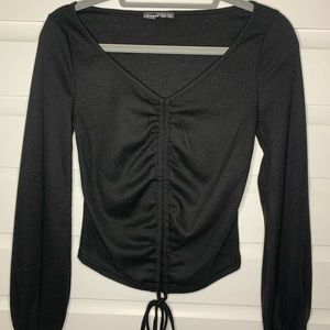 Small black long sleeve shirt